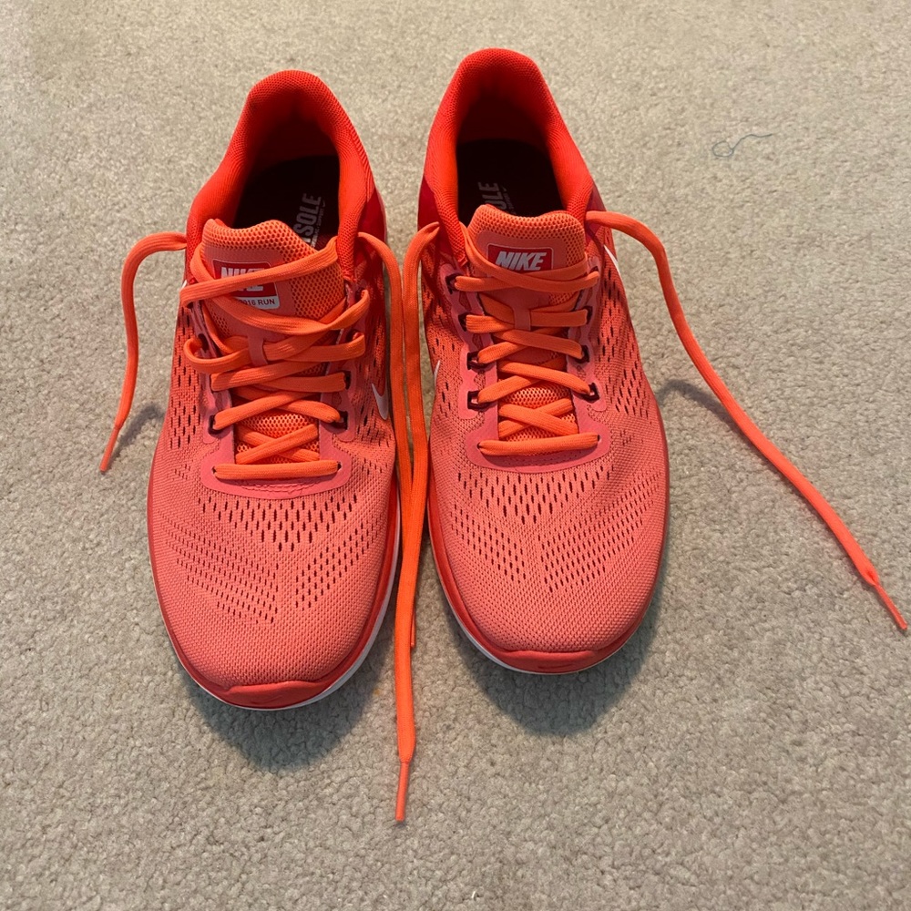 Orange Nike sneakers